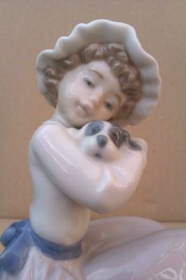 Lladro/Nao Lady with a puppy 'A Big Hug' Figurine